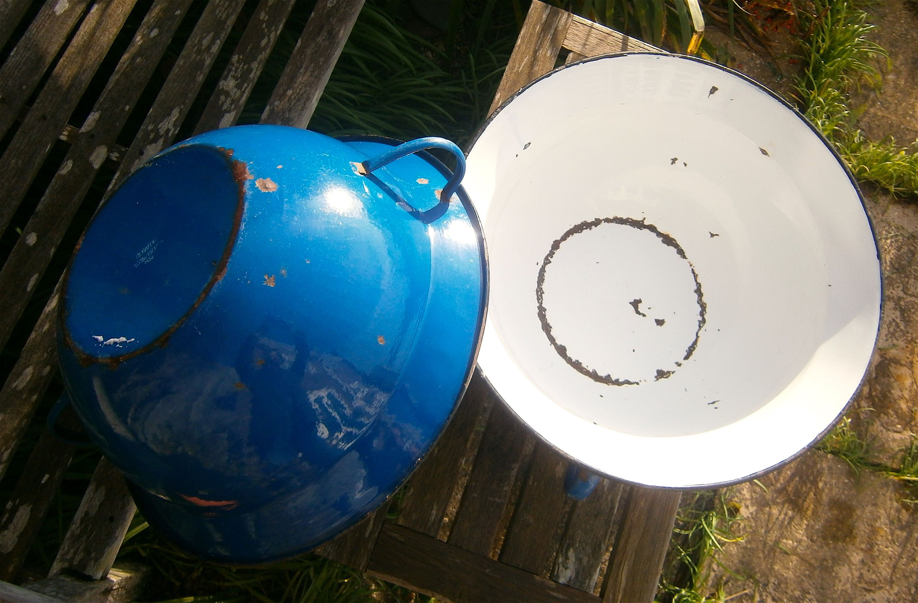 A pair of French enamel two-handled pans, 57cm diameter, 22cm high